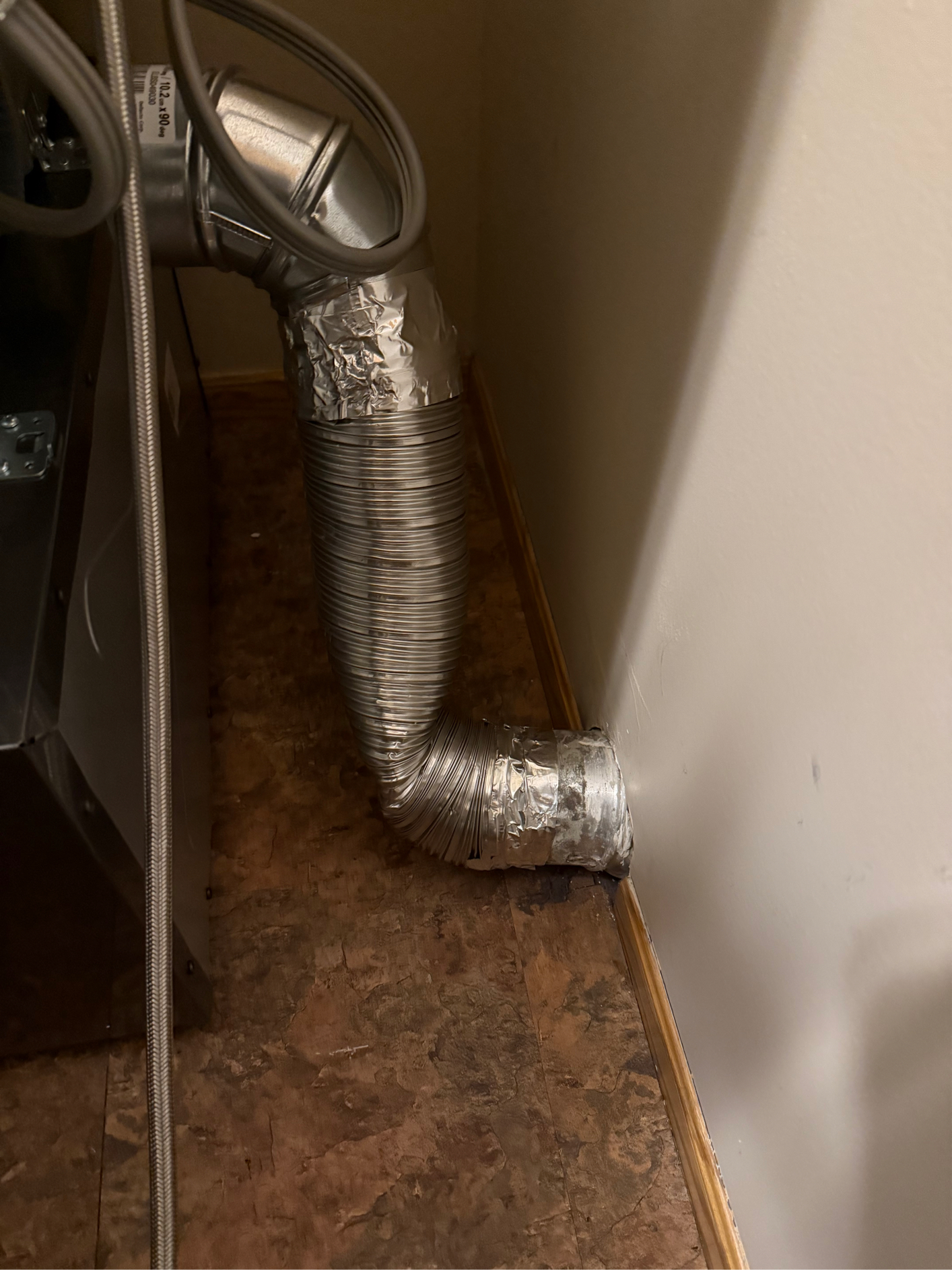 Crushed and damaged dryer vent pipe